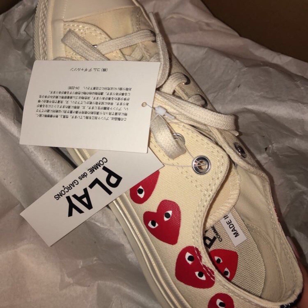CDG cream low tops.